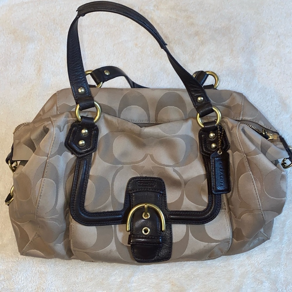 Authentic Coach bag. Tan with brown trim. Dark brown satin interior.